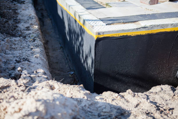 Professional Emergency Waterproofing technician working in Fort Campbell, KY